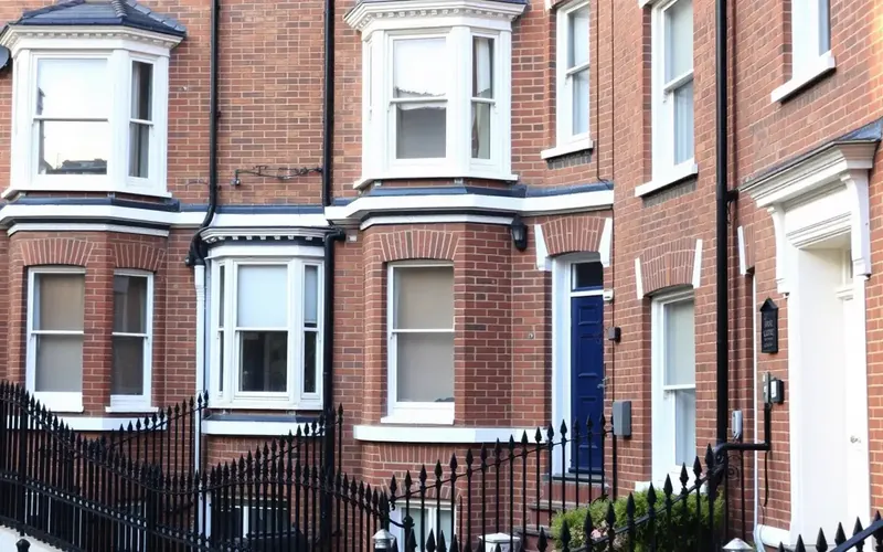 Victorian brick terraced houses with bay windows
